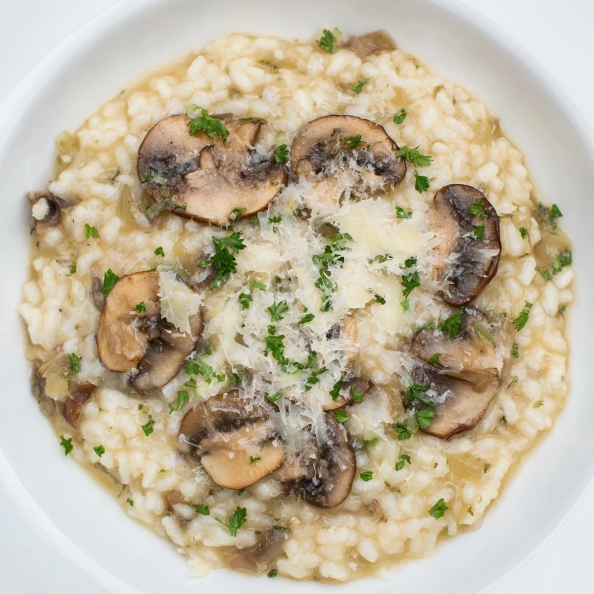 Tempting close-up of stove-top creamy risotto, perfectly cooked with a creamy texture.