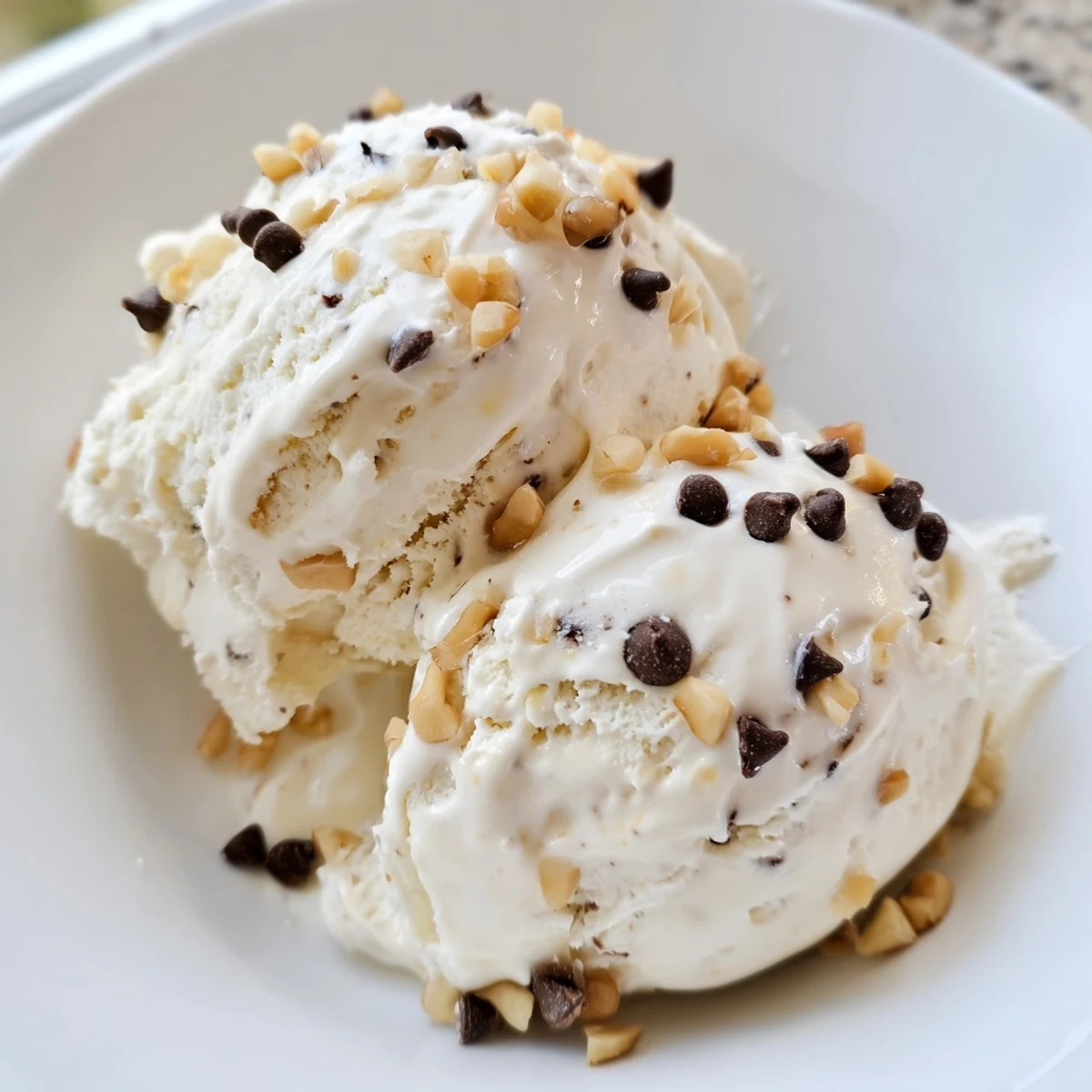 Creamy cottage cheese ice cream, swirled with berry mix-ins, ready to cool you down.