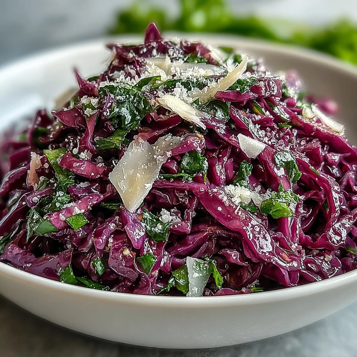 Crisp Honeycrisp apple slices and savory shaved Parmesan cheese mixed into a vibrant Red Cabbage Coleslaw With Apple and Parmesan.