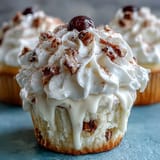 Cinco de Mayo Tres Leches Cupcakes: moist vanilla cakes drenched in sweet milk blend, crowned with light whipped cream and festive berries.