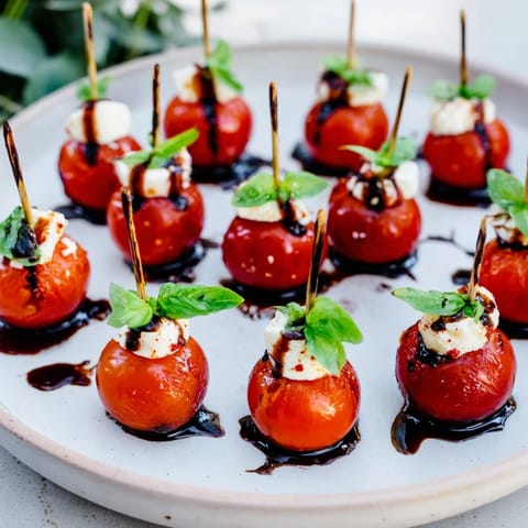 Vibrant Fresh Caprese Salad Skewers, ready to be enjoyed, showcasing the red tomatoes and white mozzarella.