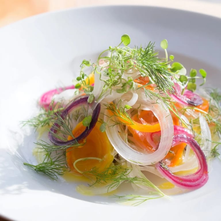 Fresh, light, and delicious "Spinning Top" salad: a close-up of the crisp, vibrant vegetable arrangement.