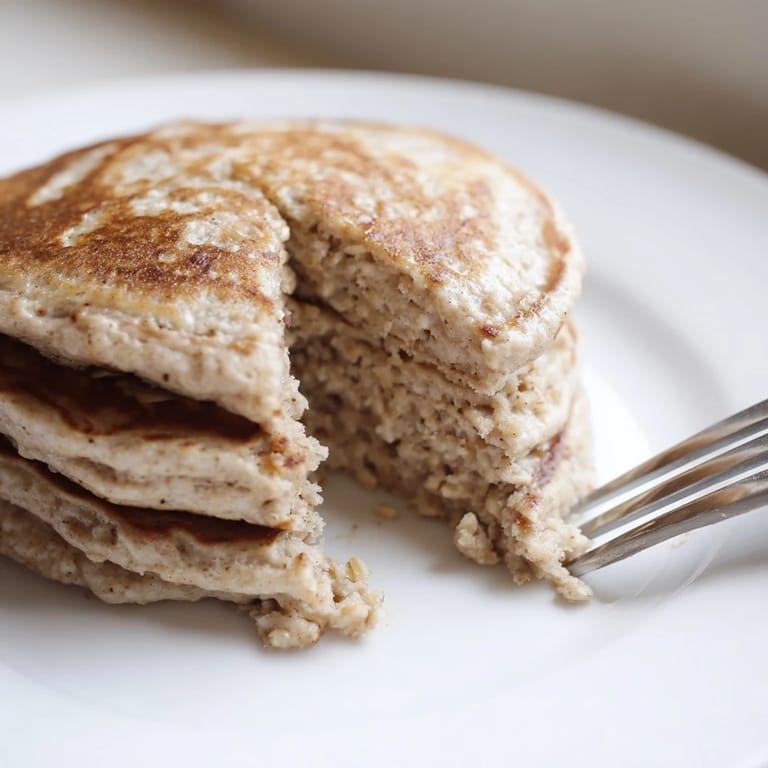 Fluffy and delicious banana oat pancakes, perfect for a quick and healthy American breakfast.