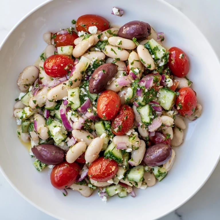 Creamy white beans mingle with tomatoes and herbs in this refreshing Mediterranean White Bean Salad.
