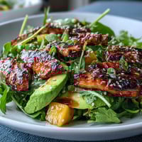 Mango Green Tea Grilled Chicken Salad with Sesame Seeds, vibrant and refreshing, features juicy marinated chicken over crisp greens with toasted sesame crunch.